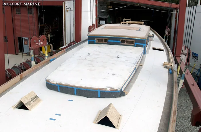 The deck and deckhouse under construction, masked and primed.