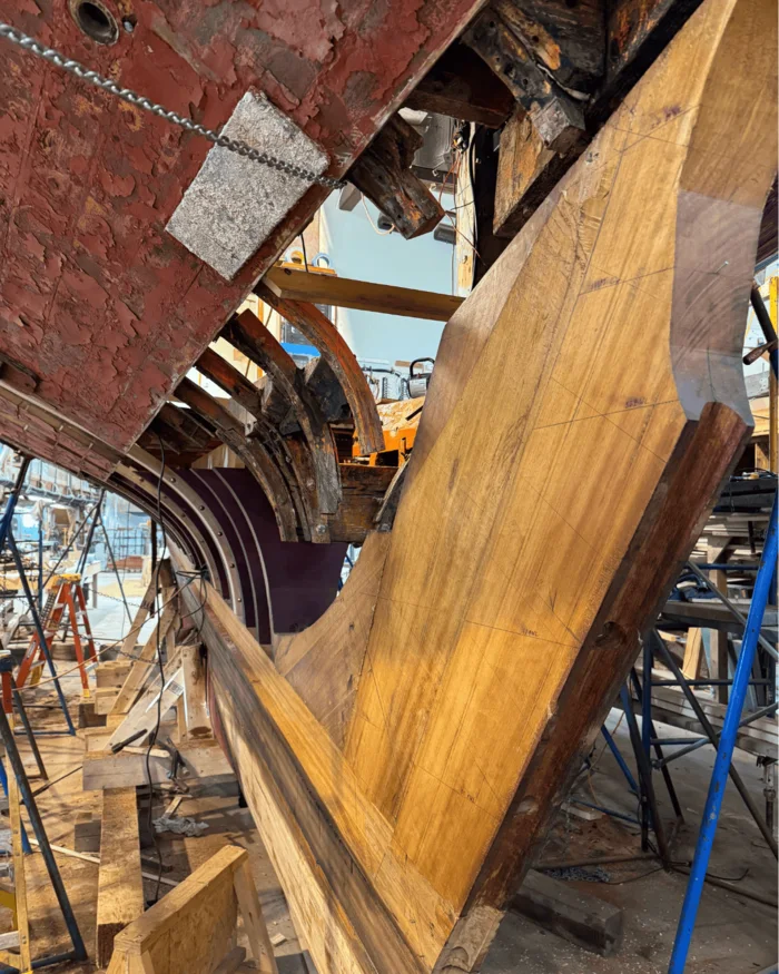 New timber let into the backbone of the hull, clamped and fastened.